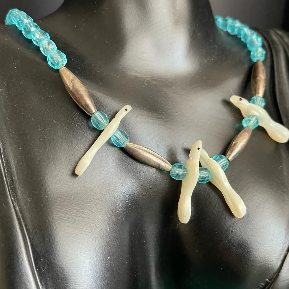Native Sterling silver unmarked mother of pearl bird carved necklace